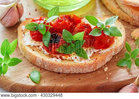 Bruschetta With Baked Cherry Tomatoes, Cream Cheese (cottage Cheese Or Ricotta), Garlic, Fresh Basil