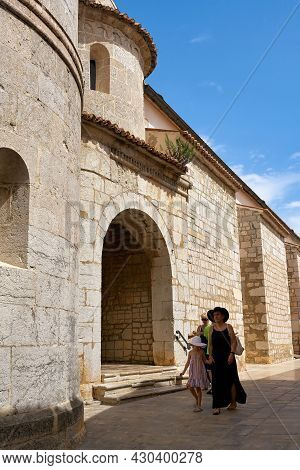 Krk, Croatia - August 09, 2021: Tourists At The Cathedral Of St. Quirinus In The Old Town Of Krk In 