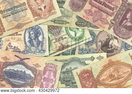Some Historic Hungarian Pengo Banknotes Mixed On The Table