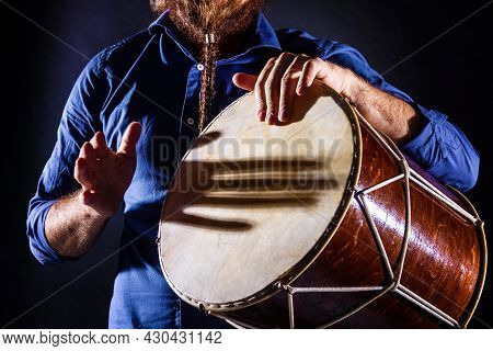 Closeup Male Hands Are Drumming On Ethnic Rhythm Percussion Musical Instrument Jembe. Drummer Is Pla