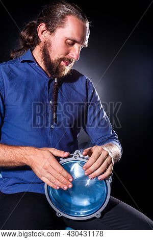 Closeup Drummer Male Hands With Drum. Man Is Drumming On Metallic Blue Percussion Musical Instrument