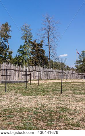 Jamestowne, Va, Usa - April 1, 2013: Historic Site. Portrait Inside Fort With Black Iron Crosses On 
