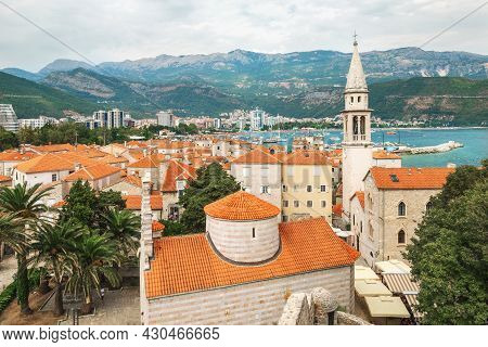 Landscape Of Old Town Budva: Ancient Walls And Red Tiled Roof. Montenegro, Europe. Budva - One Of Th