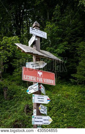 Ojcow, Poland - August 04, 2021:  Tourist Trail Board Signs Next To Krakow Gate, In Ojcow National P