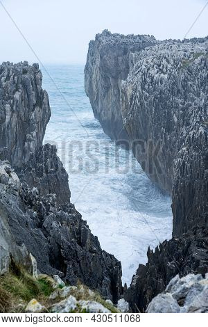 Landscape Of The Karst Limestone Sea Cliffs In Asturias In The Llanes Coast, North Of Spain, With Th