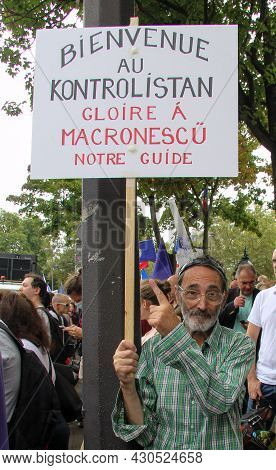 Paris, France - August 21, 2021: Activist Of The Anti-macron, Anti-health Passport Policy During The