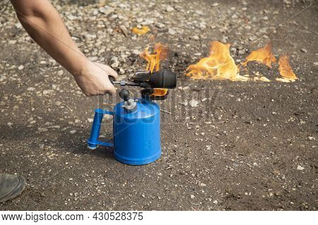 A Gasoline Blowtorch.using A Gasoline Blowtorch For Repairs.