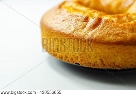 Freshly Made Madeira Ring Loaf Cake Decorated On White Background