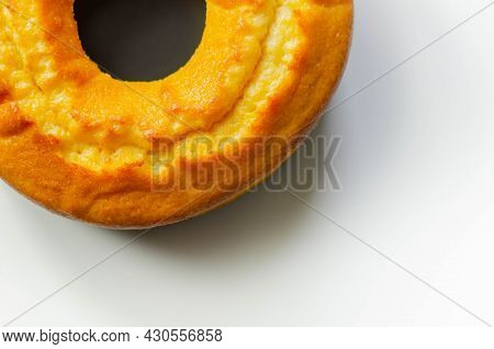 Freshly Made Madeira Ring Loaf Cake Decorated On White Background