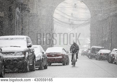 Snowfall On Snow-covered Narrow City Streets, Selective Focus.
