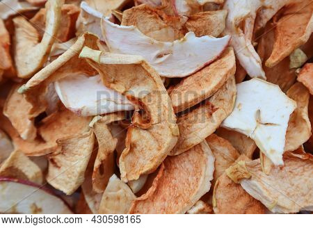 Background Of Slices Of Slices Of Dried Apples Close-up