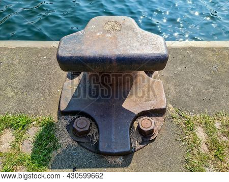 Different Bollards In Front Of The Water At The Port Of Kiel.
