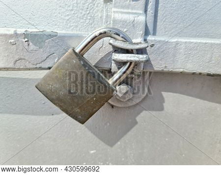 Close Uo Of A Lock At A Close Metal Door