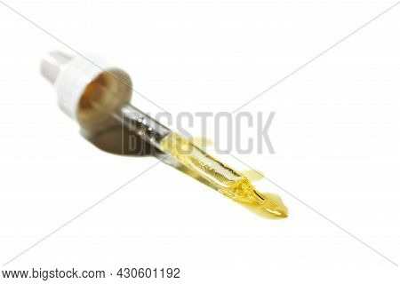 Liquid Oil Serum Drop In Pipette Isolated On White Background. Retinol, Aha, Bha Acid, Collagen Skin