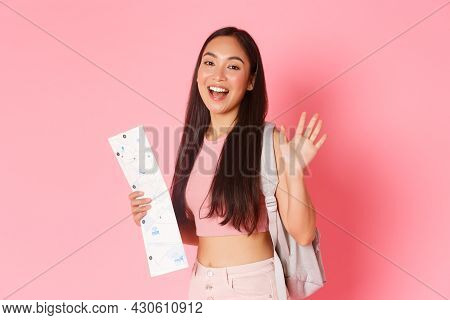 Travelling, Lifestyle And Tourism Concept. Cheerful Beautiful Asian Girl In Summer Clothes And Backp