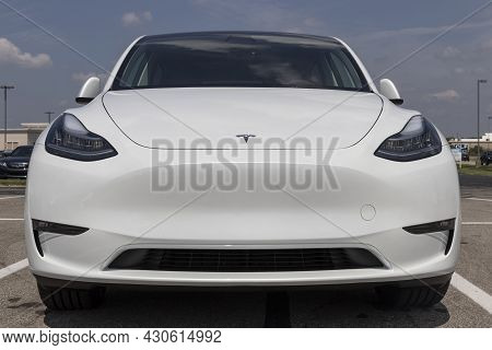 Indianapolis - Circa August 2021: Tesla Model 3 Ev Electric Vehicle On Display. Tesla Products Inclu