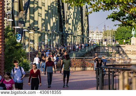 Walking Over Popular Hohenzollern Bridge In Cologne - Cologne, Germany - June 25, 2021