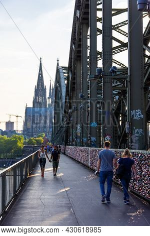 Walking Over Popular Hohenzollern Bridge In Cologne - Cologne, Germany - June 25, 2021