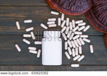 Ling Zhi Mushroom And Capsule With White Bottle Mockup