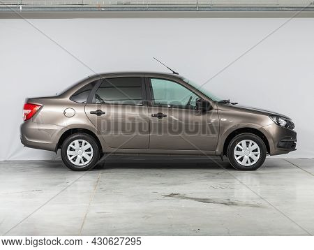 Novosibirsk, Russia - July 21, 2021: Gray Lada Granta,  Side View. Popular Car On A Parking