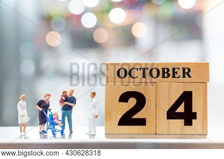 Doctor And Children On Wooden Block 24 October Background . World Polio Day Concept