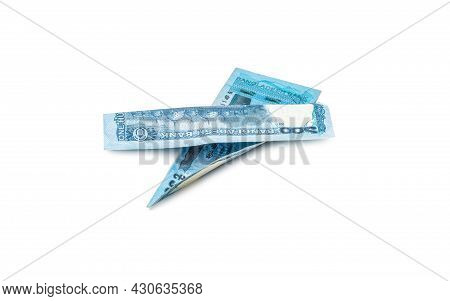 Two Folded One Hundred Taka Bangladesh Banknotes On An Isolated White Background