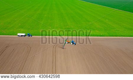 Above View, Overhead View On Tractor Until Spraying Big Endless Farmland Dragging Mounted Wide Agric