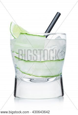 Gimlet Cocktail In Modern Glass With Ice Cubes And Straw, Cucumber And Lime Slice On White Backgroun