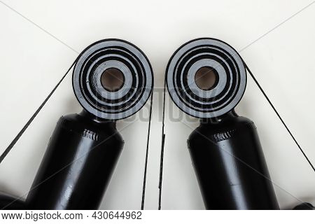 Two Silent Blocks On Shock Absorbers, Parts For Car Repair. A Set Of Spare Parts For Servicing The C