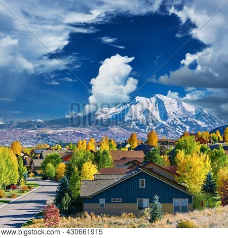 Residential neighborhood in Colorado at autumn, USA. Mount Sopris landscape.