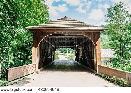 Historical Wooden Covered Bridge Built In 1840 Over Zdobnice River,near Village Of Peklo,czech Repub