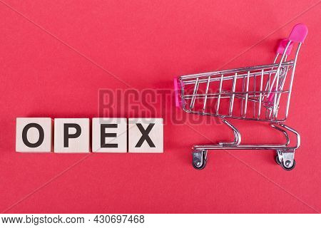 Opex Letter Wooden Blocks, Business Concept. Opex Stands For Operational Expenditure.