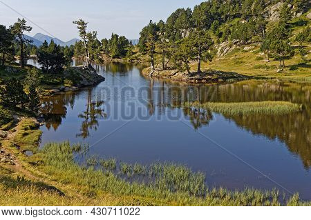 Reflection On  Achard Lake In Chamrousse Resort, Belledonne Range, French Alps