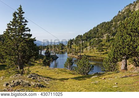 The Shores Of Achard Lake In Chamrousse Resort, Belledonne Range, French Alps
