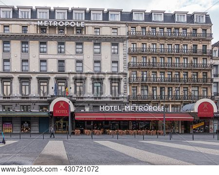 Brussels, Belgium - July 31, 2021: Front Facade Of Hotel Metropole On Place De Brouckère. Red Awning