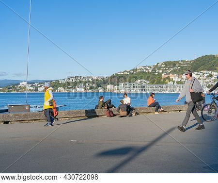 Wellington New Zealand - July 30 2021; People Enjoying, Relaxing And Commuting Along The Great Harbo
