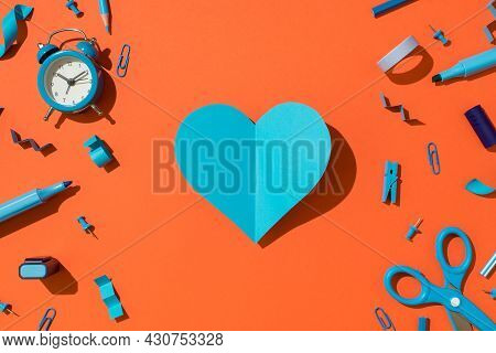 Top View Photo Of Blue Folded Paper Heart And Blue School Supplies Stationery Alarm Clock Markers Sc
