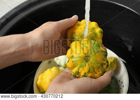 Woman Washing Pattypan Squashes Above Sink, Closeup
