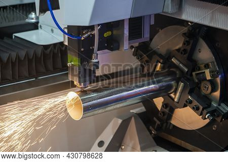 The Fiber Laser Cutting Machine Cutting The Stainless Steel Tube Control By Cnc Program. The Sheet M