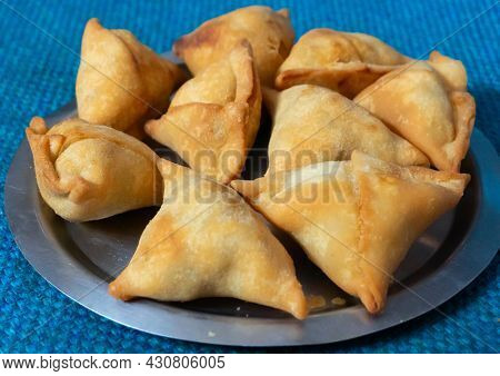 Homemade Samosa, Samsa Or Smosa. A Vegetarian Spicy Indian Special Traditional Street Food. Iftaari 