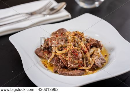 Traditional Turkish Liver Kebab Cuisine. Leaf Liver Spicy. Delicious Turkish Ciger.