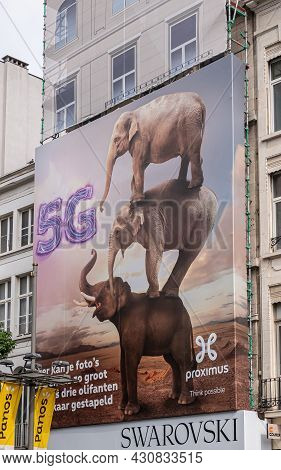Antwerpen, Belgium - August 1, 2021: Large Billboard Showing 3 Elephants On Top Of Each Other Promot