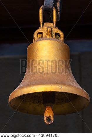 Copper Old Vintage Bell. Decor Concept Element In The Interior Of A Deck, Cabin Of A Ship, Restauran