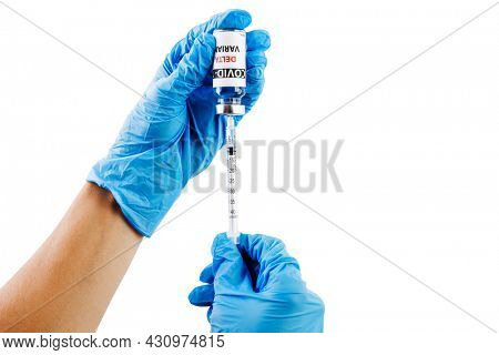 Vaccine bottles covid - 19 delta variant, vials medicine and syringe injection isolated on white. Coronavirus DELTA 2019-ncov. Vaccine bottles on the woman hand