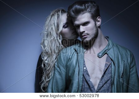 young woman standing close to her lover , fashion young couple