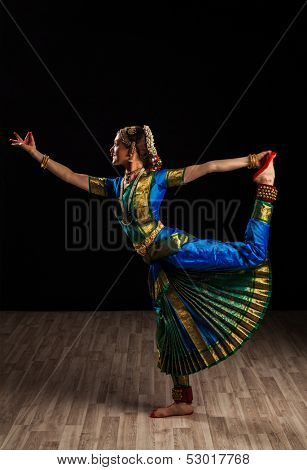 Young beautiful woman dancer exponent of Indian classical dance Bharatanatyam