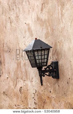 Lamp On  Concrete Wall