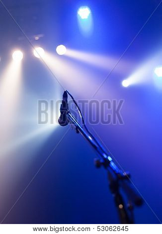 Microphone On Empty Stage Waiting For A Voice