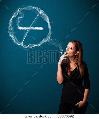 Pretty young lady smoking unheathy cigarette with no smoking sign