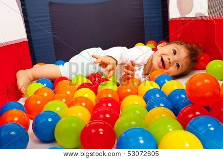 Happy Baby Playing With Balls